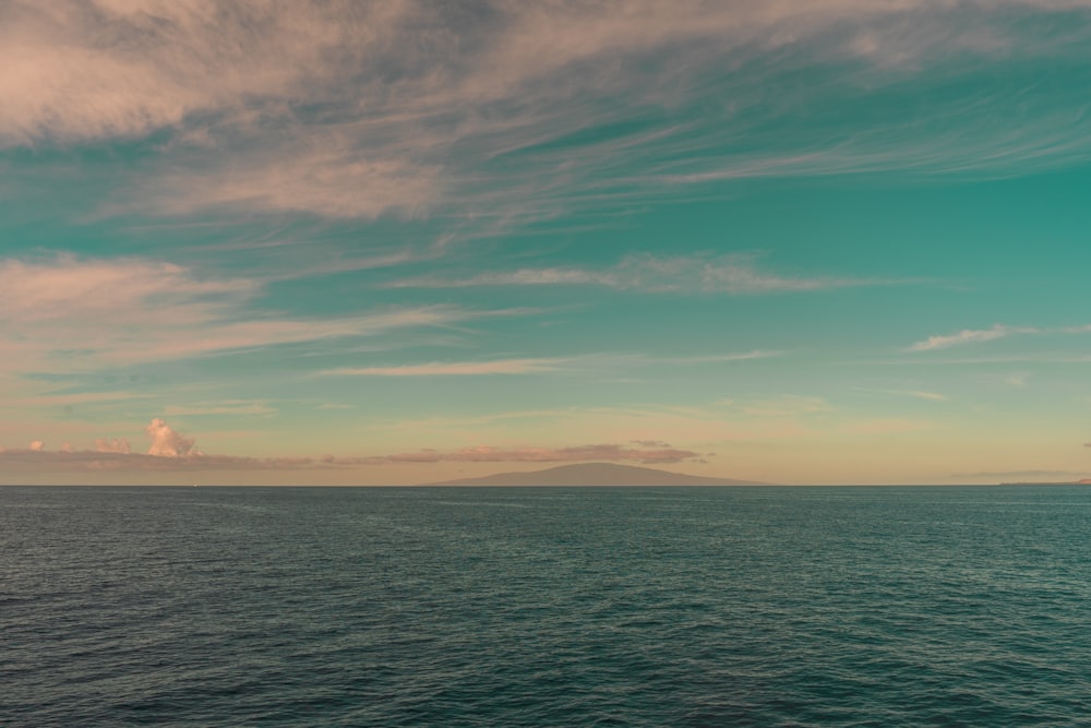 blue sea under blue sky during daytime