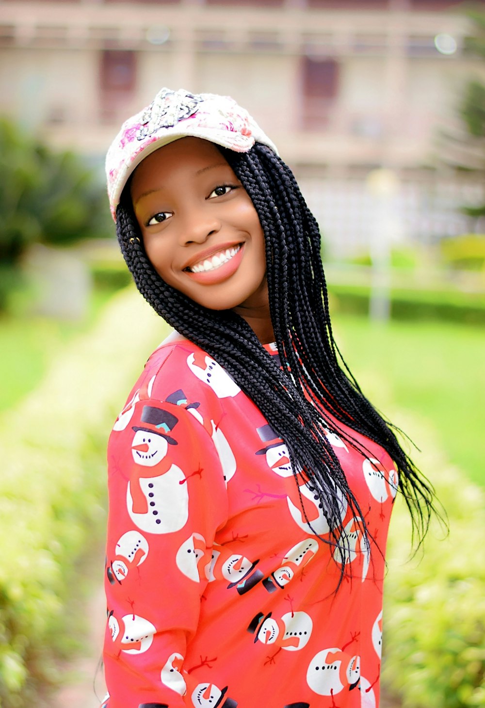 woman in red and white hijab