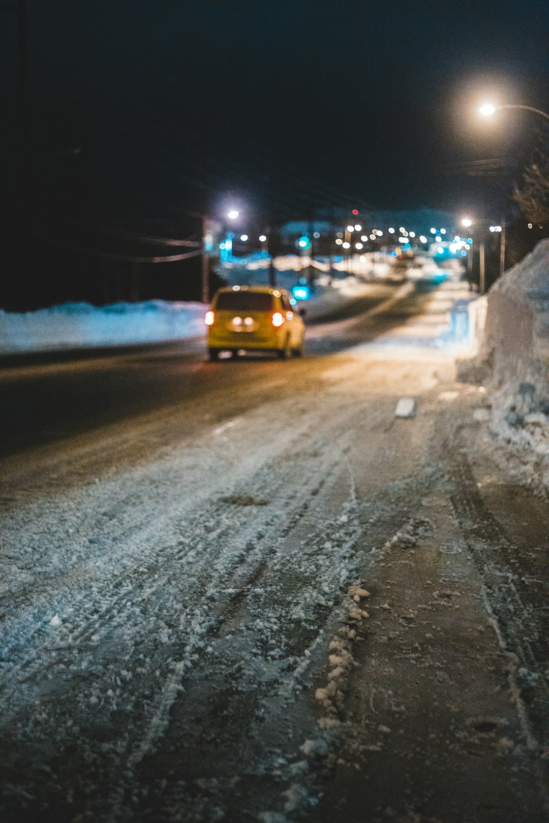 yellow car on road during night time