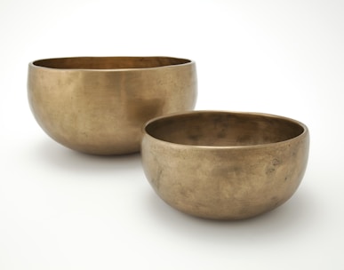 brown ceramic bowl on white surface