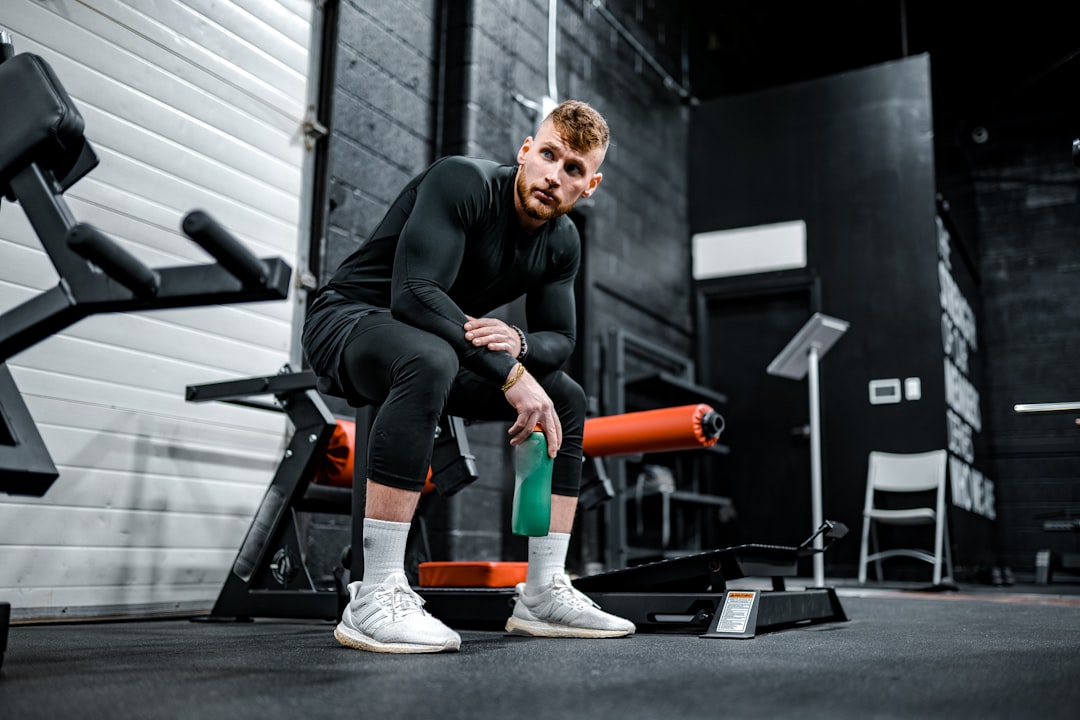 woman in black long sleeve shirt and black pants sitting on exercise equipment, Photo shoot with professional body builder @CrowterSix -Instagram | Shot on Lumix S1 + Sigma 35mm L Mount F/1.4<p></figure>Photo by @VisualsByRoyalZ</p><p>Model: @CrowterSix</p><p>Please tag both of us if you use this photo on social media! :)