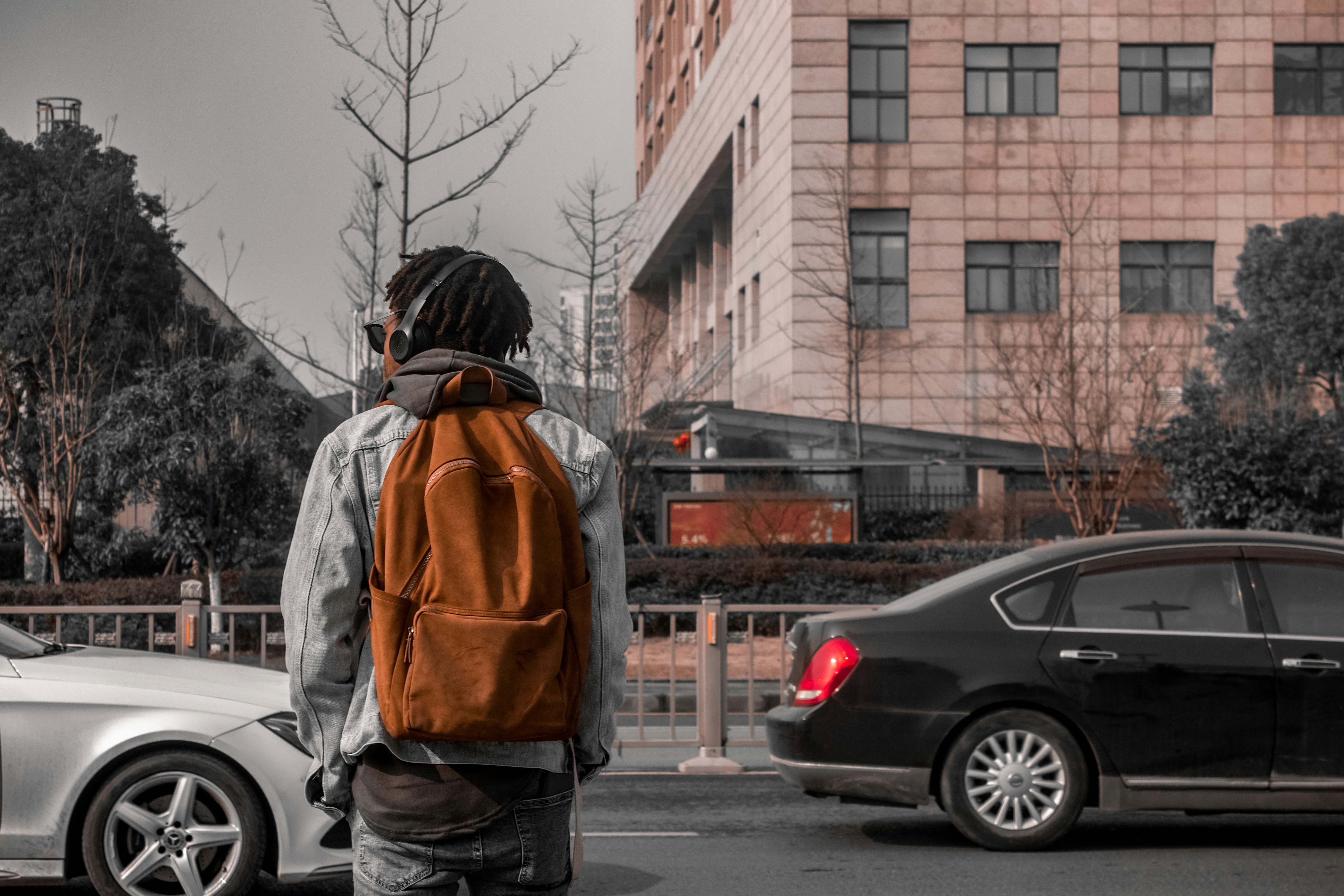 A sleek black commuter backpack with organized compartments