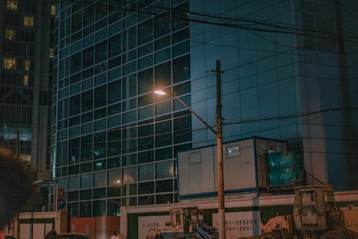 Night view of a well-lit building after electrical installation.