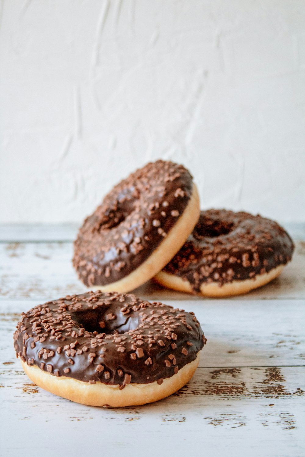 brown donut on white table