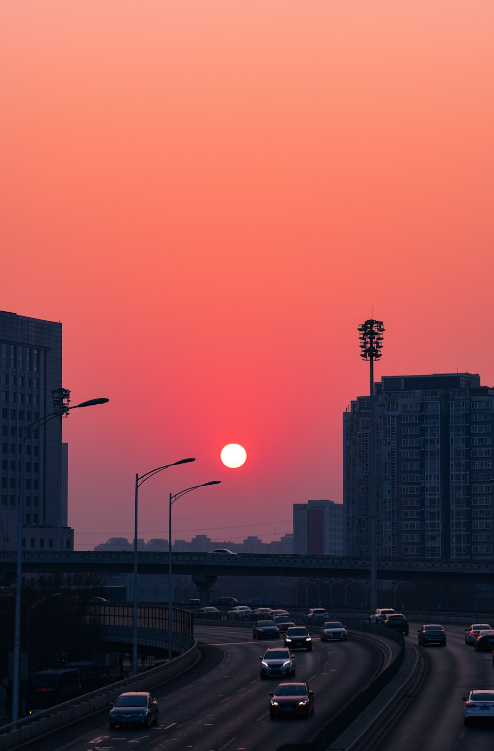 silhouette of city buildings during sunset