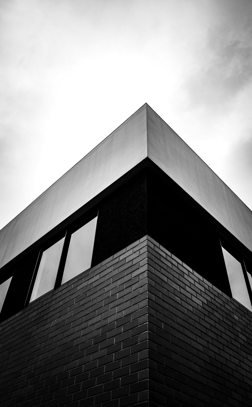 grayscale photo of concrete building