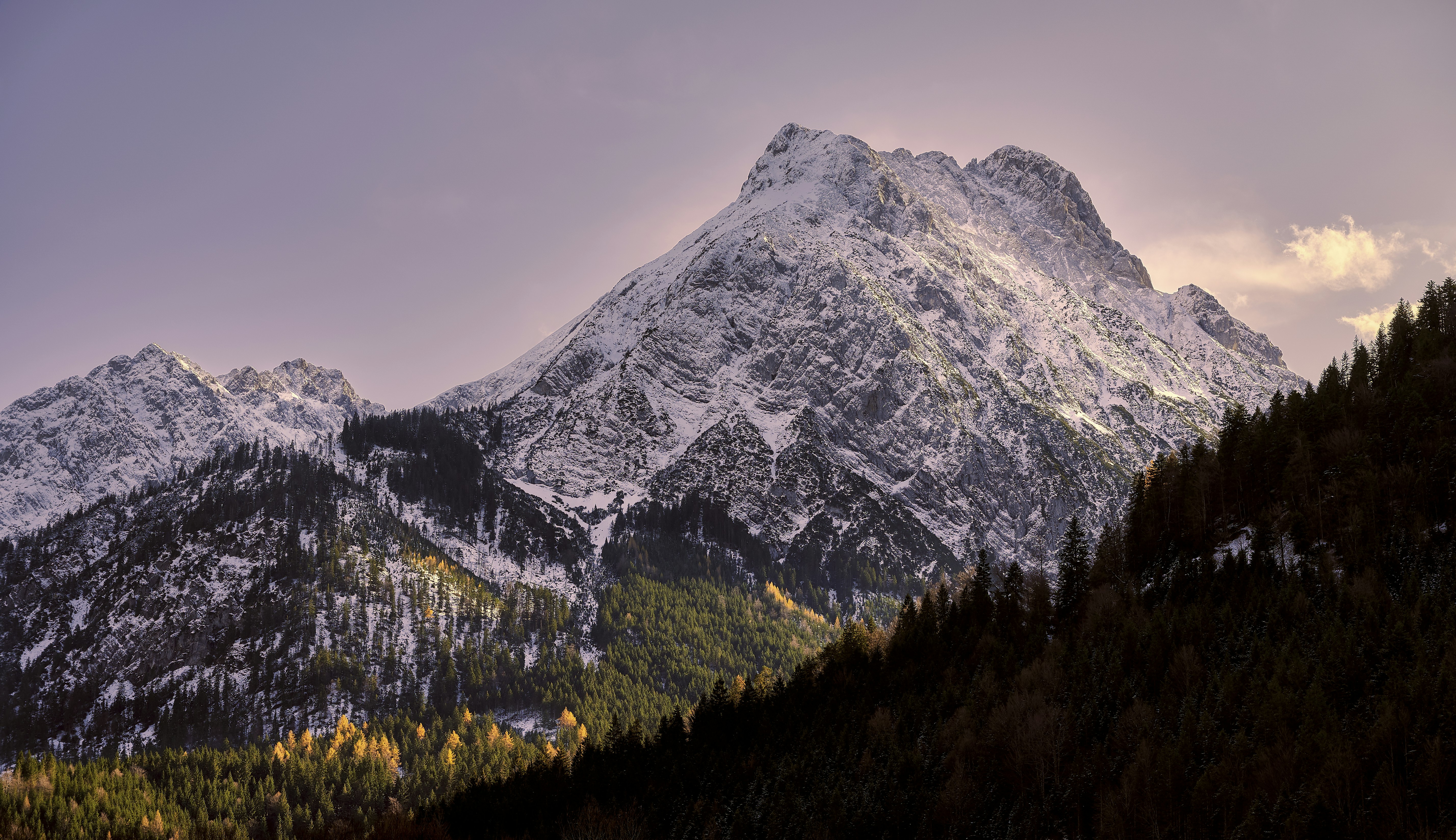 gray and white mountain under gray sky