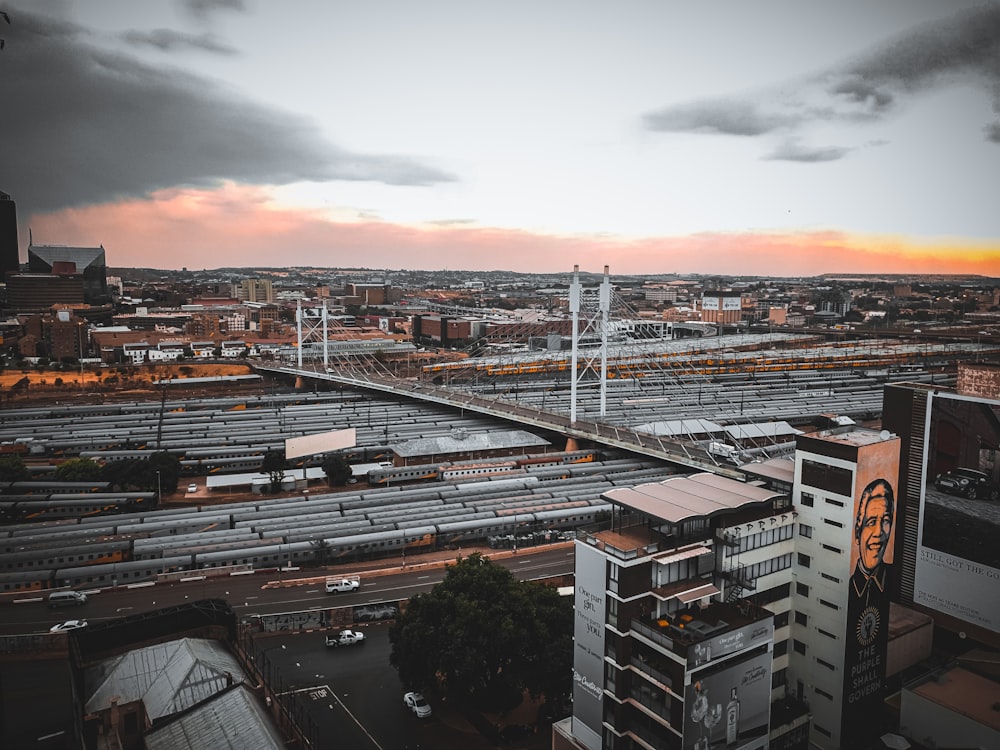 city buildings under cloudy sky during daytime