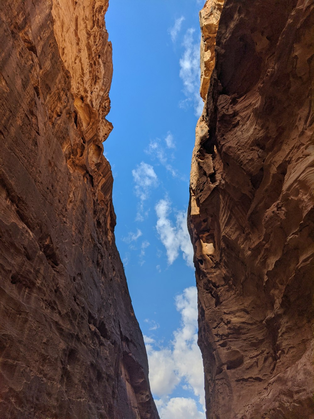 brown rock formation under blue sky during daytime