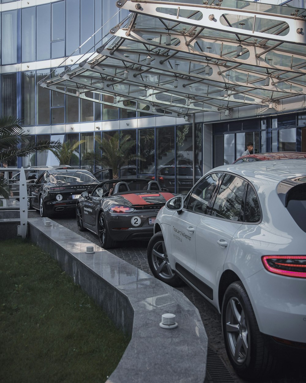 cars parked on parking lot during daytime