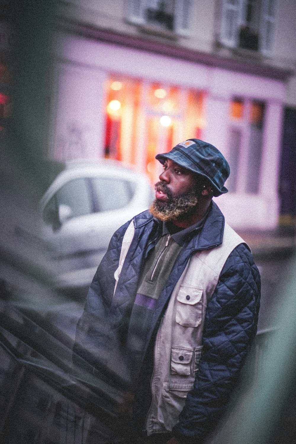 man in black jacket and black knit cap