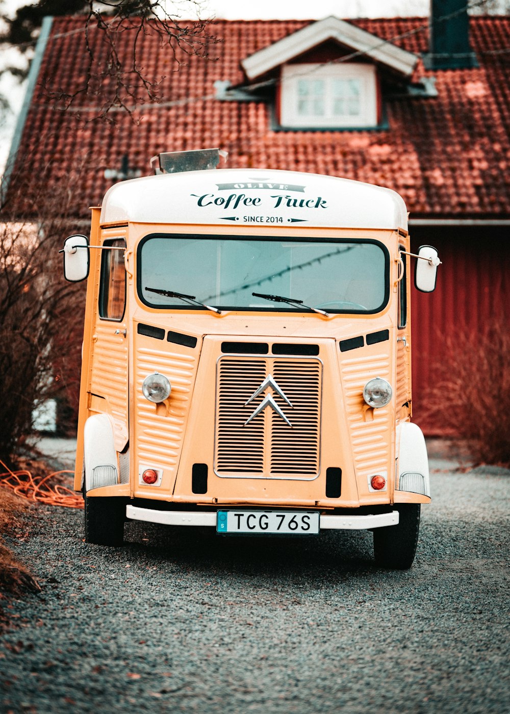 white and brown vintage truck