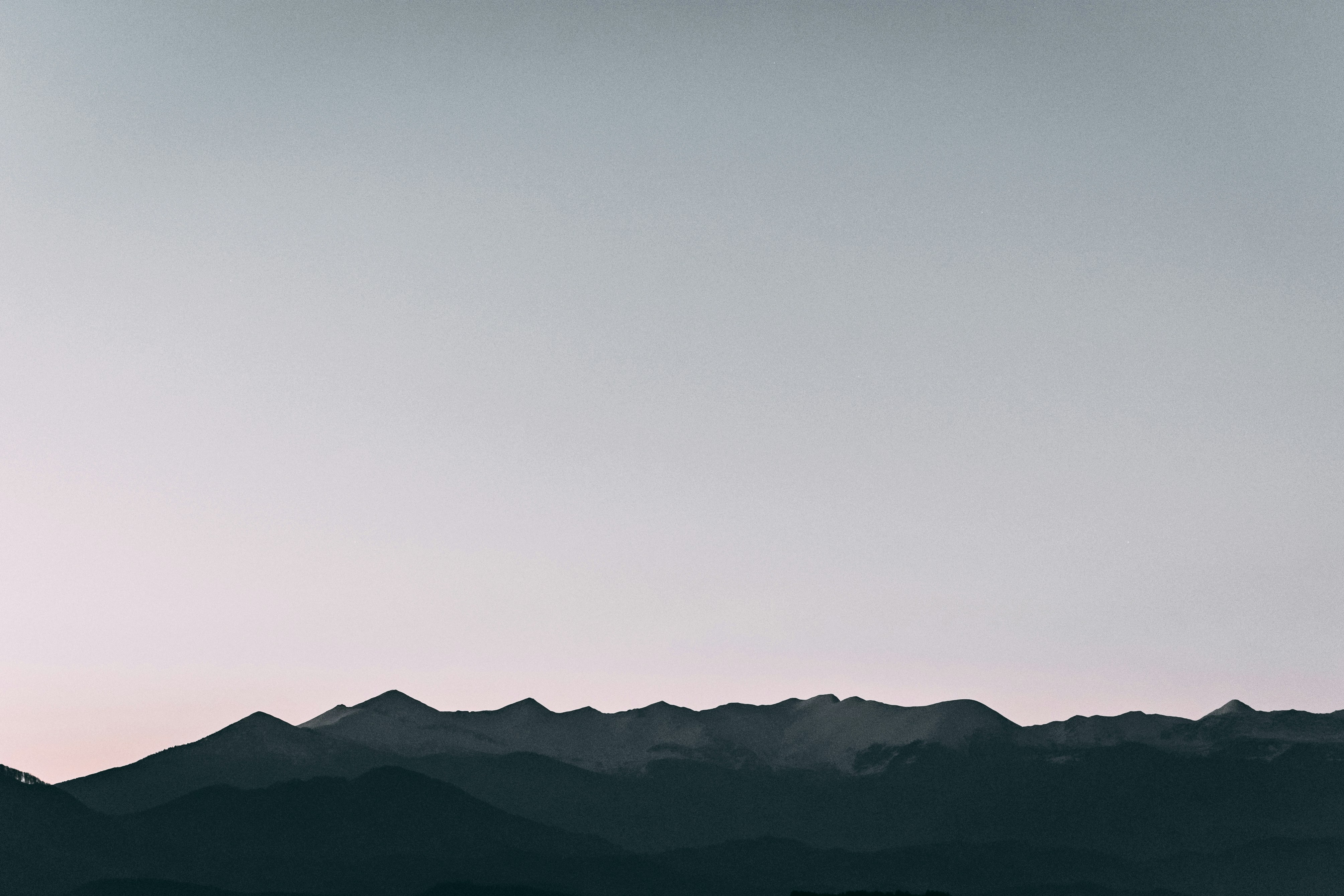 silhouette of mountains during daytime