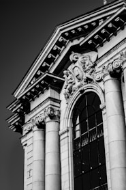 grayscale photo of concrete building
