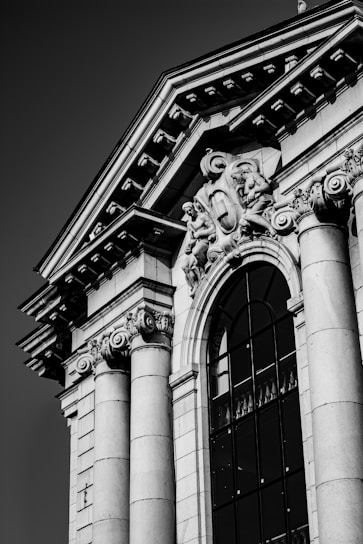 grayscale photo of concrete building