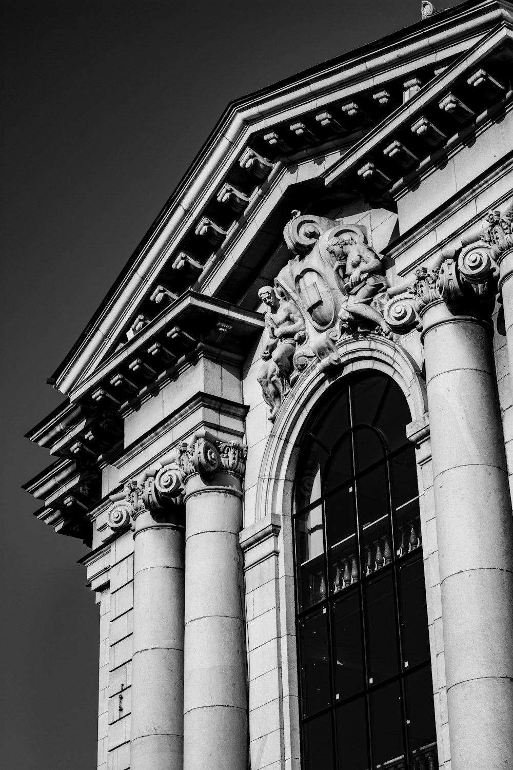 grayscale photo of concrete building