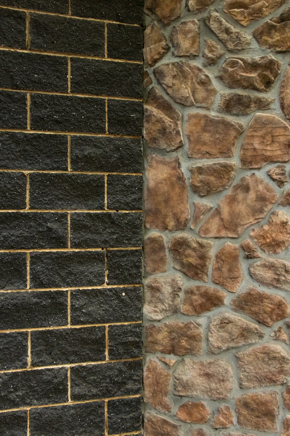 brown and gray brick wall
