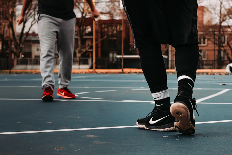 Basketball team standing together on the sideline