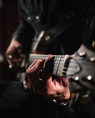 Intermediate guitarist practising technique