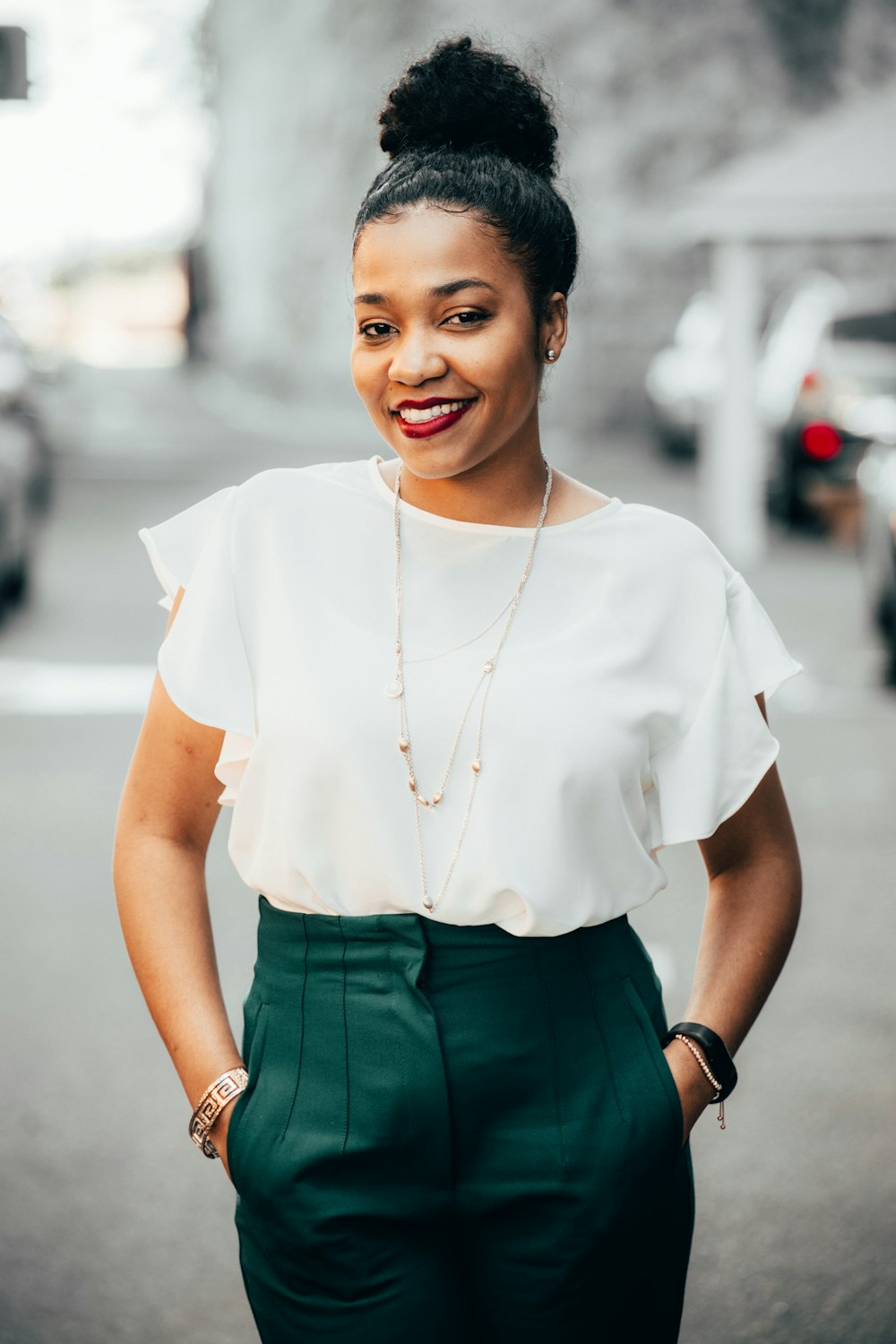 woman in white crew neck t-shirt and green skirt