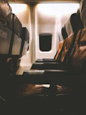 Interior view of an acoustic cabin showing comfortable seating and subtle lighting for focused work.