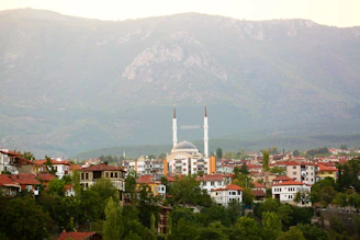 A scenic view of the Atlas Mountains with Berber villages nestled in the valleys.