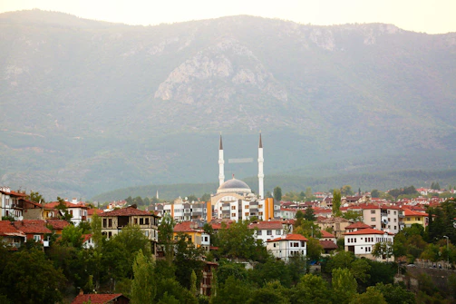 A scenic view of the Atlas Mountains with Berber villages nestled in the valleys.