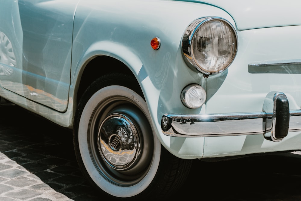 white car with chrome wheel