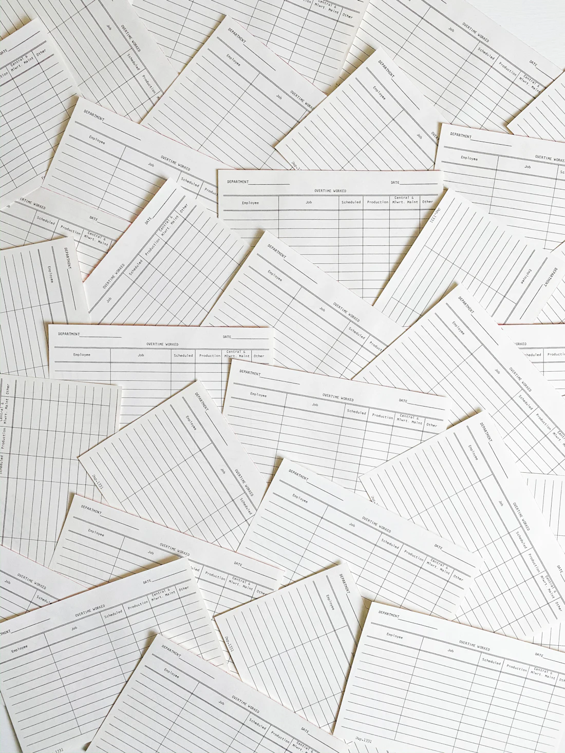 Carbonless invoice and delivery-note sets on an office desk