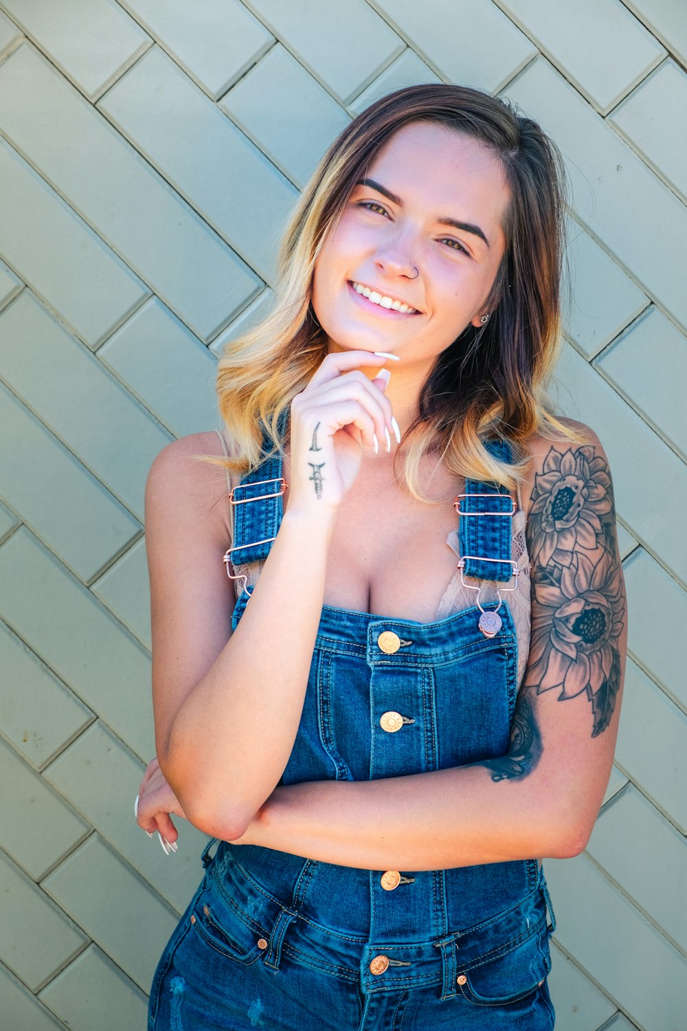 woman in blue denim button up vest