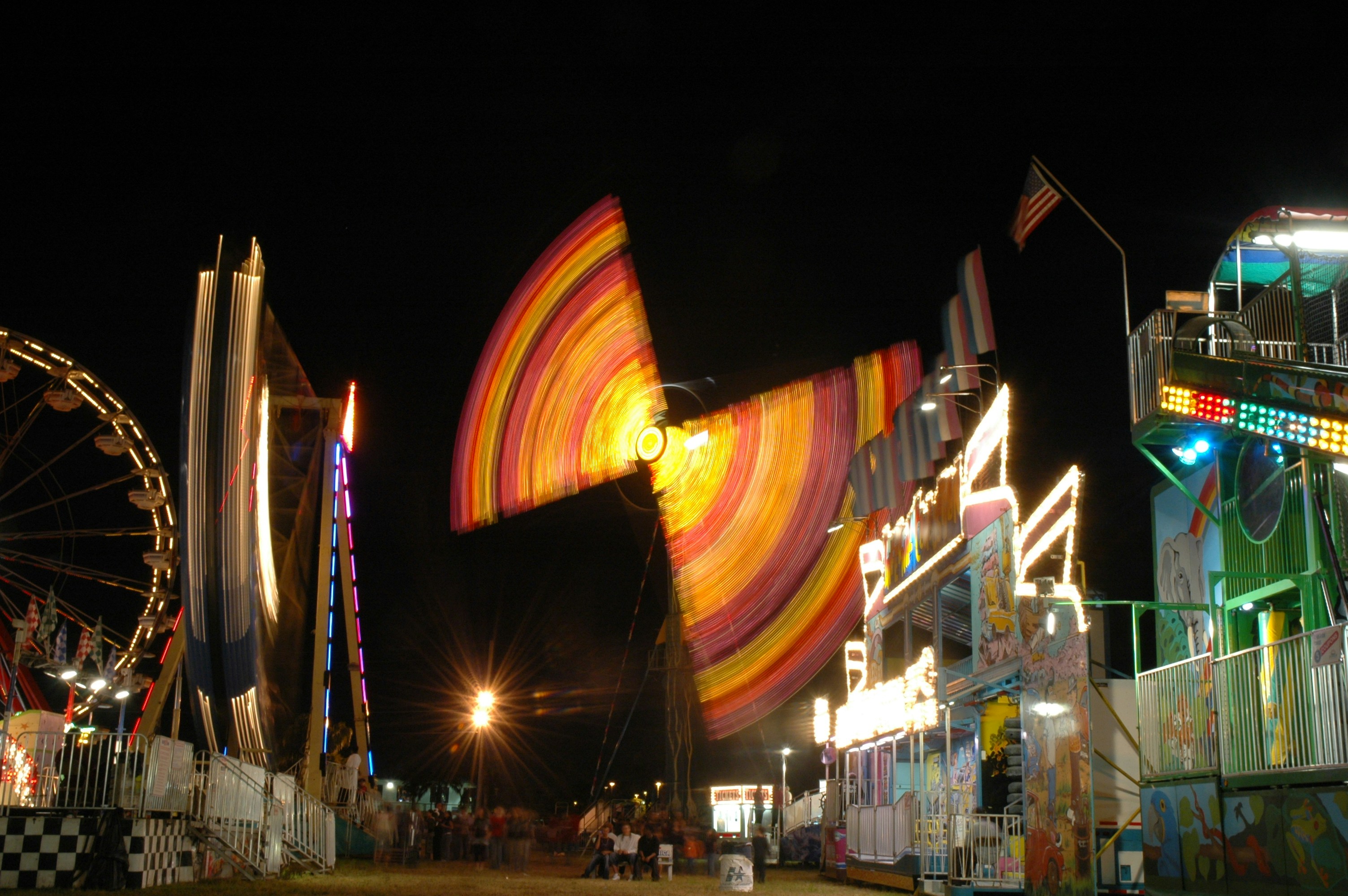 people walking on street during night time