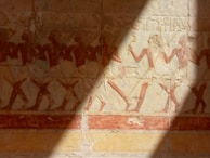 A vibrant depiction of ancient Egyptian daily life in a mural.