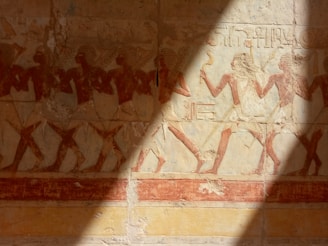 A vibrant depiction of ancient Egyptian daily life in a mural.