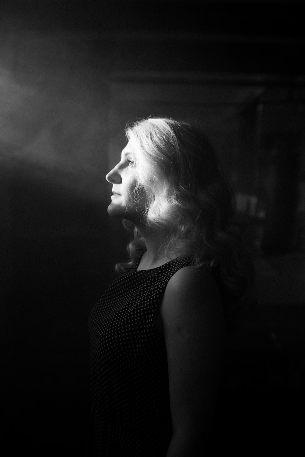 grayscale photo of woman in tank top