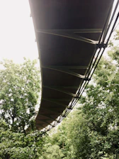 Photo of a sturdy PRFV pedestrian bridge surrounded by greenery.