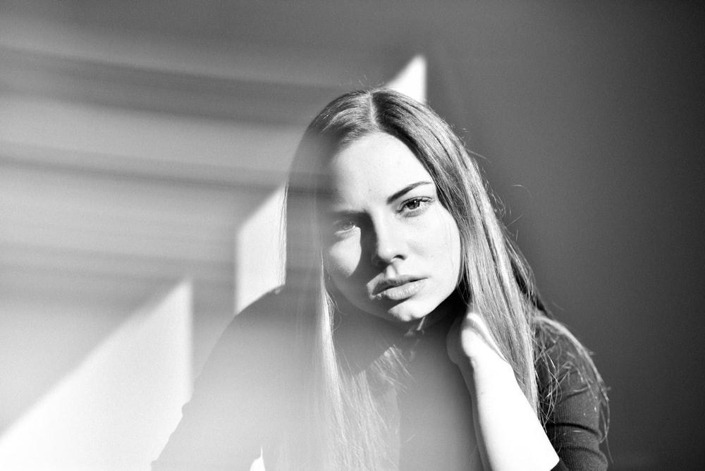 woman in white shirt in grayscale photography