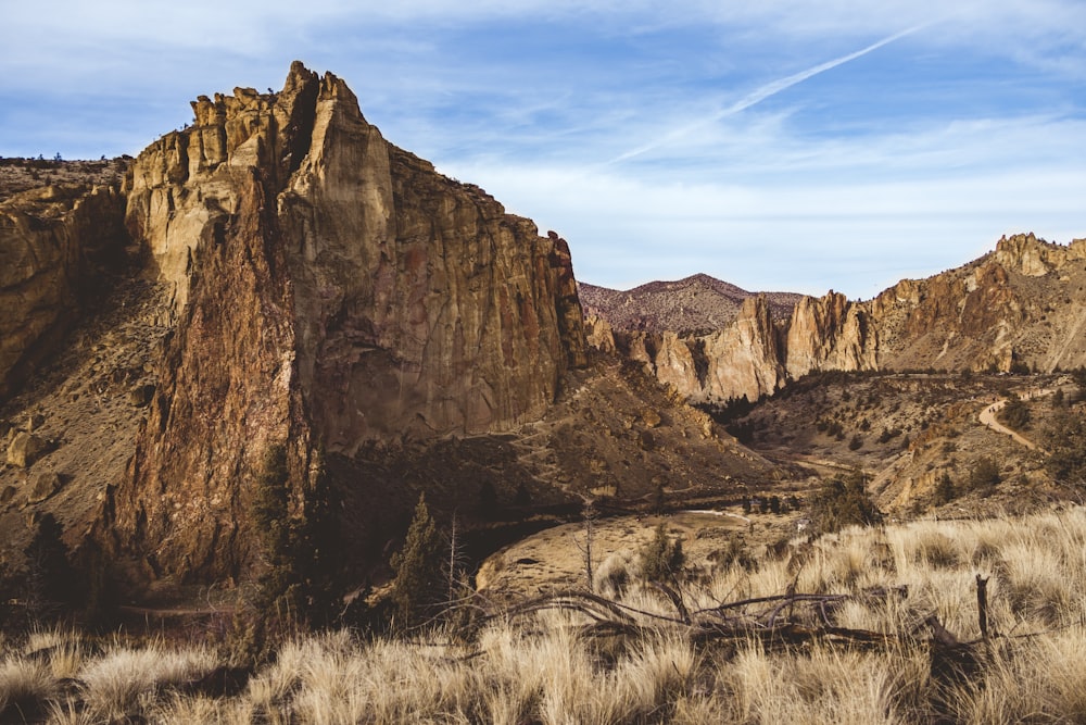 brown rocky mountain under blue sky during daytime