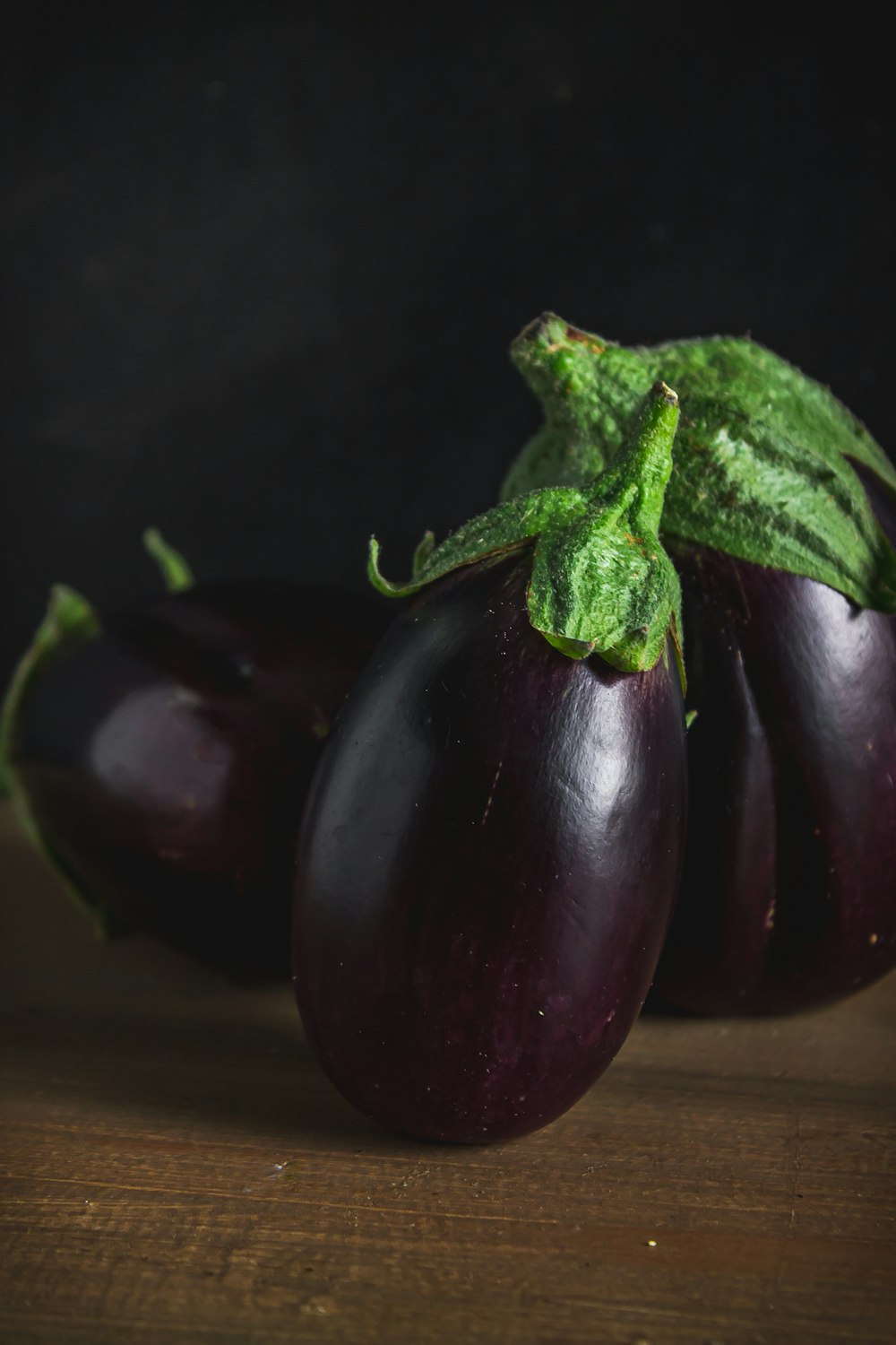 green bell pepper on brown wooden table