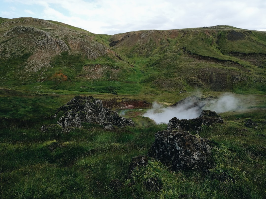 travelers stories about Hill in Reykjadalur, Iceland