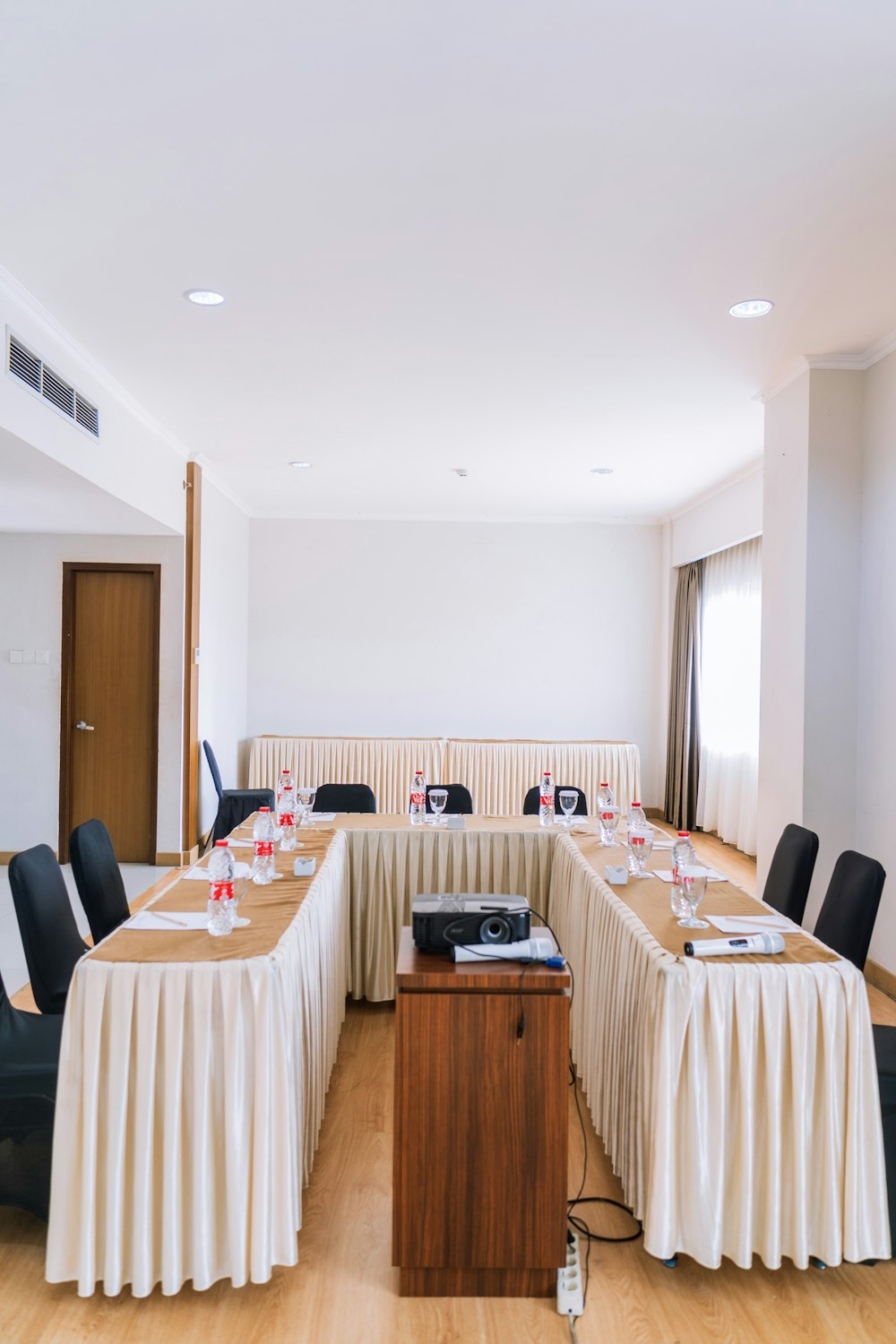 brown wooden table with chairs