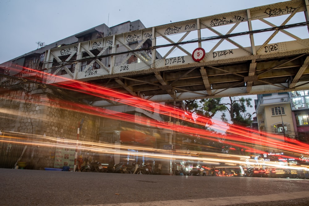 white and red train on track during daytime