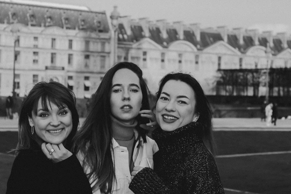 grayscale photo of 2 women smiling