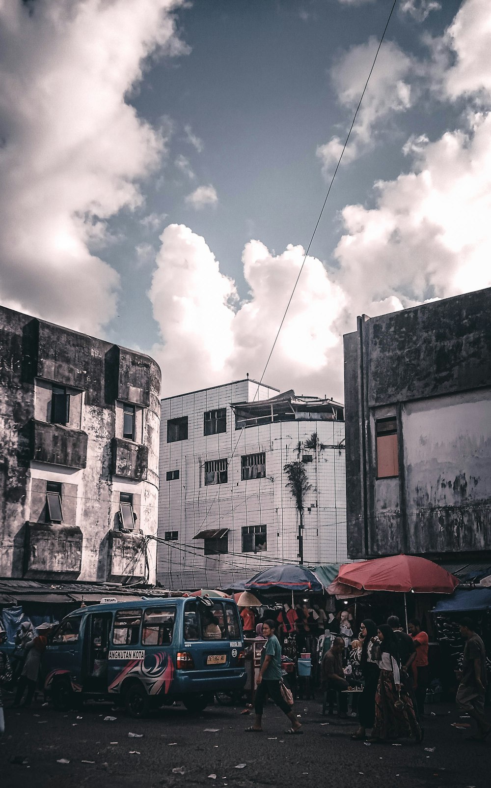 cars parked on street near building during daytime