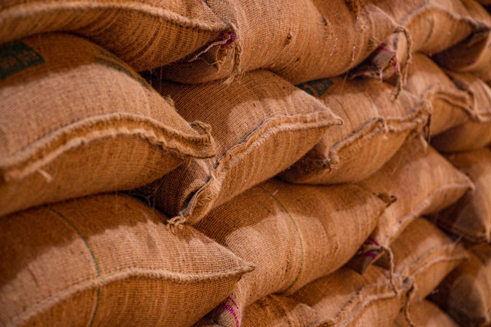 brown and red textile on brown textile