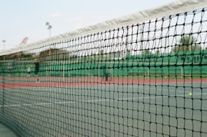soccer goal net under blue sky during daytime