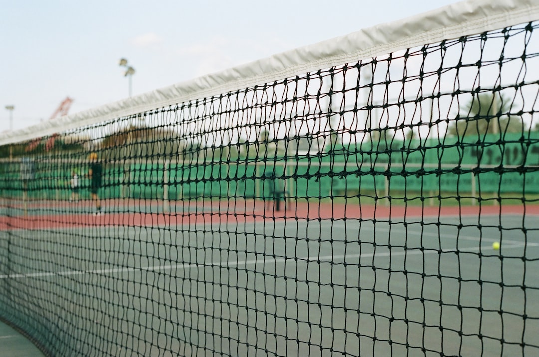 soccer goal net under blue sky during daytime