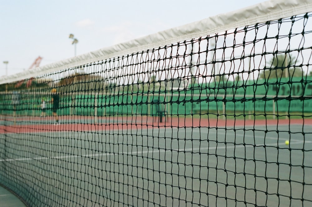 soccer goal net under blue sky during daytime