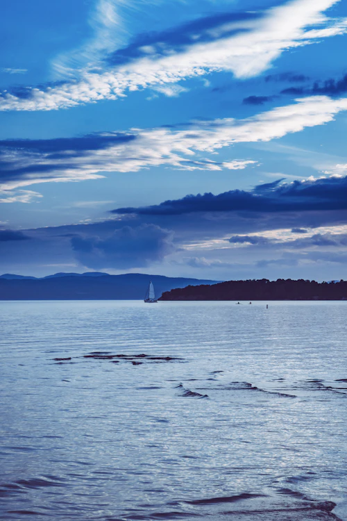 Calm dusk sky over Lake Champlain at Burlington, Vermont