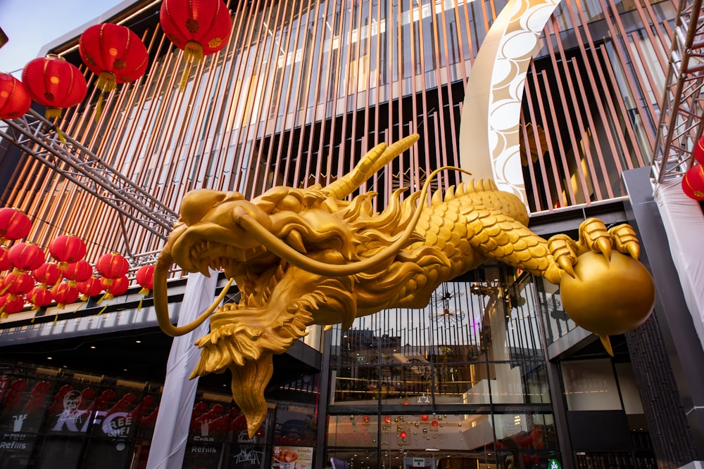 gold dragon statue in building