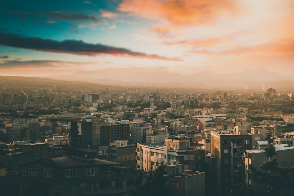 aerial view of city buildings during sunset